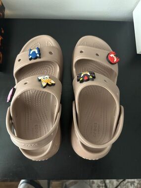 CROCS Teenager or Young Women Taupe Slide Sandals with Multicolor Charms